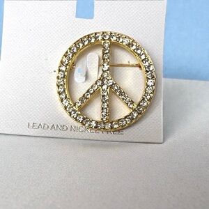 Gold Peace Sign Brooch with Crystals